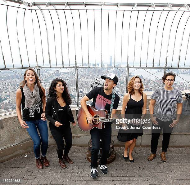 Musician Jason Mraz and the band Raining Jane perform after Jason Mraz announces his "Five Boroughs Tour" during a visit to The Empire State Building...