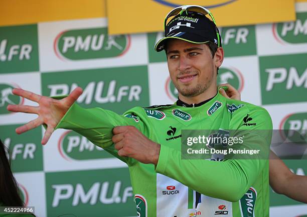 Peter Sagan of Slovakia and Cannondale takes the podium as he defended the points leader's green jersey during the eleventh stage of the 2014 Tour de...