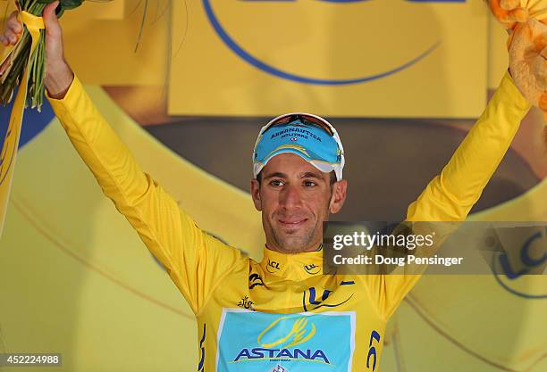 Vincenzo Nibali of Italy and the Astana Pro Team takes the podium as he defended the overall race leader's jersey during the eleventh stage of the...