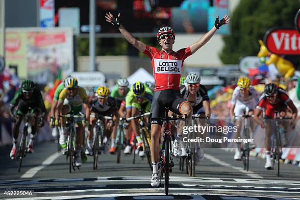 Tony Gallopin of France and Lotto Belisol celebrates as his solo breakaway eludes the peloton in the final meters to win the eleventh stage of the...