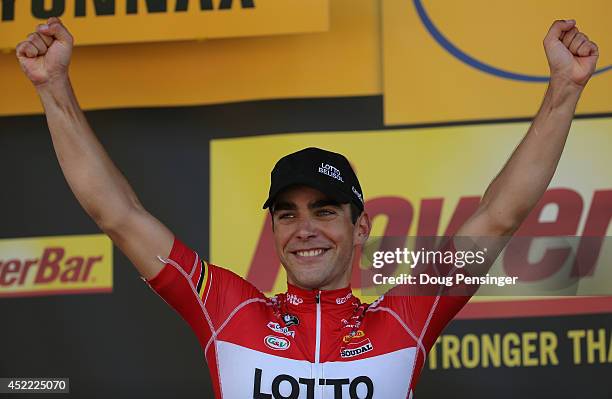 Tony Gallopin of France and Lotto Belisol celebrates on the podium after winning the eleventh stage of the 2014 Tour de France, a 188km stage between...