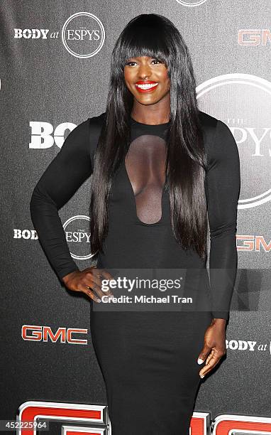 Aja Evans arrives at the BODY at ESPYS Pre-Party held at Lure on July 15, 2014 in Hollywood, California.