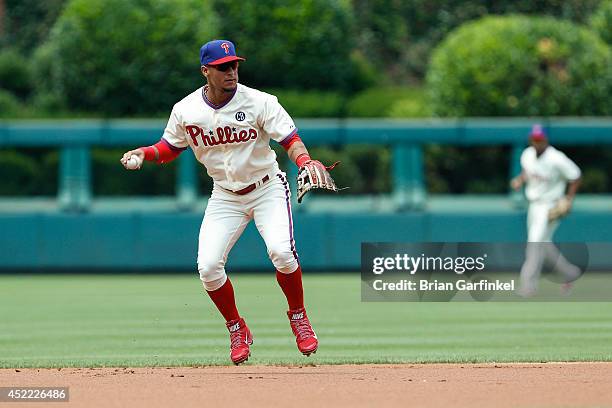 Ronny Cedeno of the Philadelphia Phillies throws the ball during the first game of a doubleheader against the Atlanta Braves at Citizens Bank Park on...