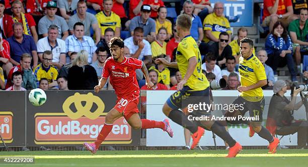 Suso of Liverpool burns past Martin Albrechtsen and Riza Durmisi of Brondby IF during the Pre-season friendly match between Brondby IF and Liverpool...