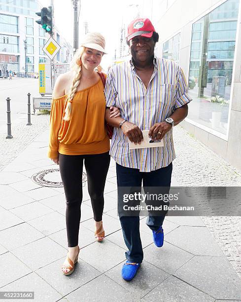 Luzandra Strassburg and Roberto Blanco sighted leaving Tapas Bar on July 16, 2014 in Berlin, Germany.