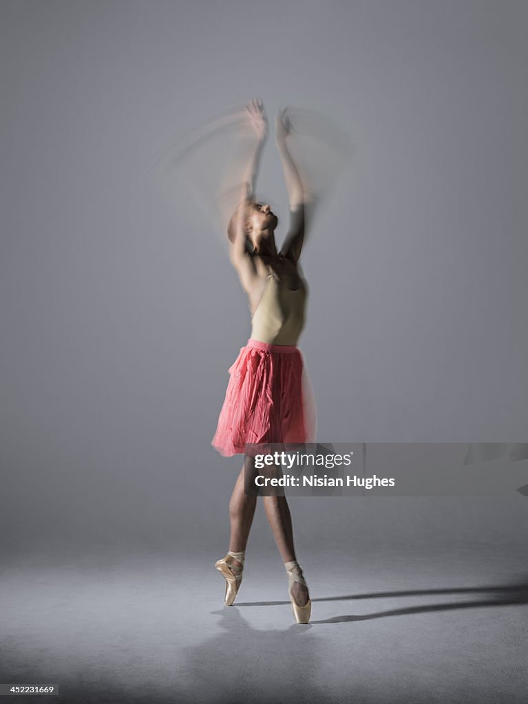 Ballerina performing Fourth Croise in studio