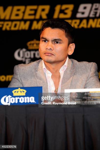 Boxer Marcos "El Chino" Maidana acknowledges his fans during the "Mayhem: Mayweather vs. Maidana II" championship rematch press conference at the...
