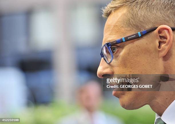 Finnish Prime Minister Alexander Stubb arrives on July 16, 2014 for a special meeting of the European Council to discuss further appointments of the...