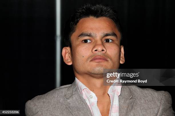 Boxer Marcos "El Chino" Maidana is interviewed during the "Mayhem: Mayweather vs. Maidana II" championship rematch press conference at the Congress...