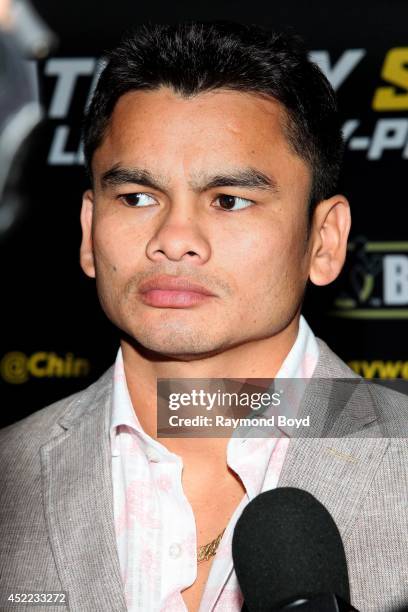 Boxer Marcos "El Chino" Maidana is interviewed during the "Mayhem: Mayweather vs. Maidana II" championship rematch press conference at the Congress...