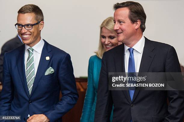 British Prime Minister David Cameron , Danish Prime Minister Helle Thorning-Schmidt and their Finnish counterpart Alexander Stubb arrive for a family...