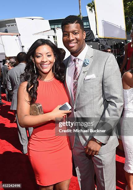 College football quarterback Jameis Winston with girlfriend Breion Allen attends The 2014 ESPYS at Nokia Theatre L.A. Live on July 16, 2014 in Los...