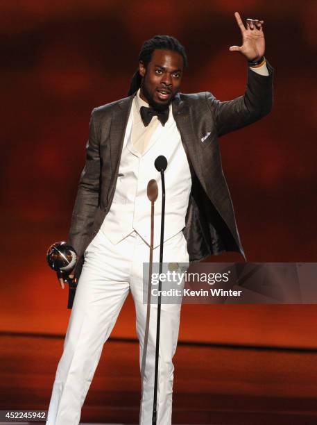 Player Richard Sherman of the Seattle Seahawks accepts the Best Breakthrough Athlete award onstage during the 2014 ESPYS at Nokia Theatre L.A. Live...