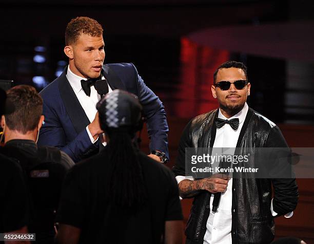 Player Blake Griffin and singer Chris Brown speak onstage during the 2014 ESPYS at Nokia Theatre L.A. Live on July 16, 2014 in Los Angeles,...