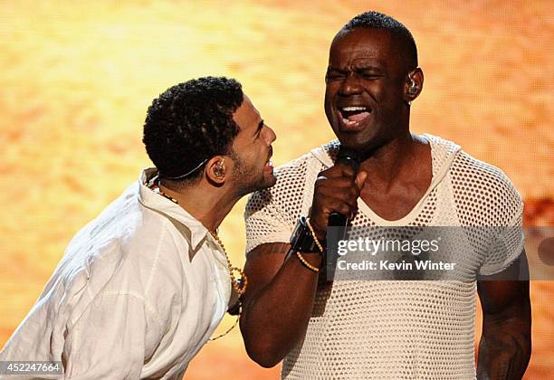 Host Drake and singer Brian McKnight perform onstage during the 2014 ESPYS at Nokia Theatre L.A. Live on July 16, 2014 in Los Angeles, California.