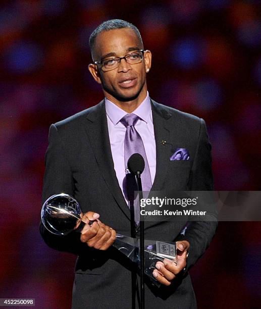 Personality Stuart Scott accepts the 2014 Jimmy V Perseverance Award onstage during the 2014 ESPYS at Nokia Theatre L.A. Live on July 16, 2014 in Los...