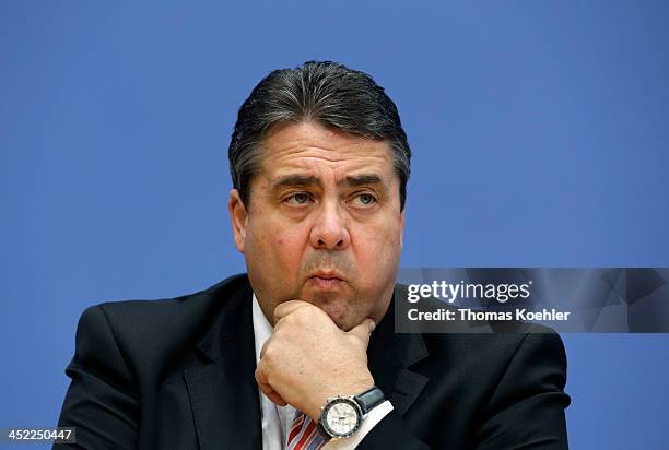 Chairman of the German Social Democrats Sigmar Gabriel during a press conference to present the three parties' coalition contract to the media on...