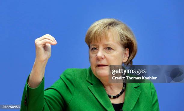 German Chancellor and Chairwoman of the German Christian Democrats Angela Merkel during a press conference to present the three parties' coalition...