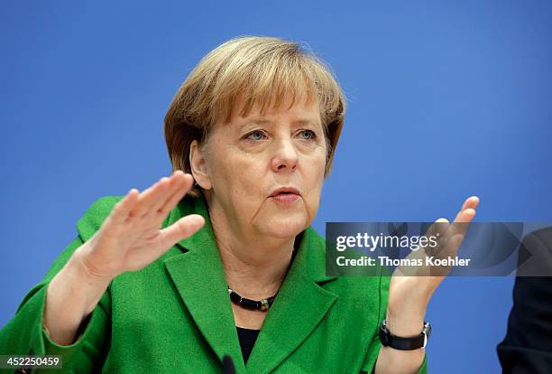 German Chancellor and Chairwoman of the German Christian Democrats Angela Merkel during a press conference to present the three parties' coalition...