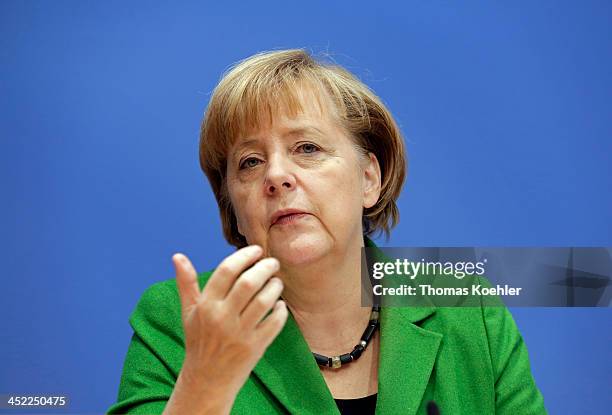 German Chancellor and Chairwoman of the German Christian Democrats Angela Merkel during a press conference to present the three parties' coalition...
