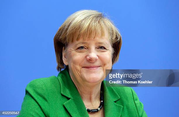 German Chancellor and Chairwoman of the German Christian Democrats Angela Merkel during a press conference to present the three parties' coalition...
