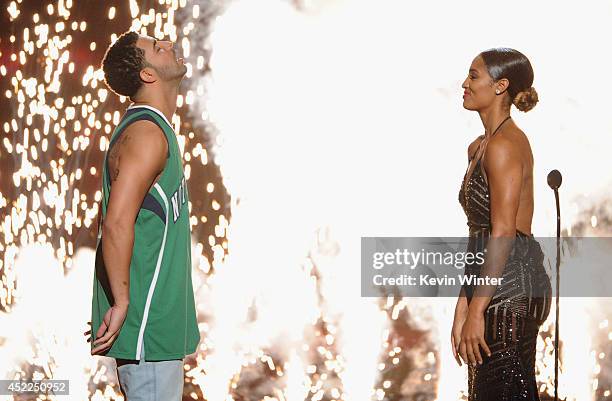 Host Drake and WNBA player Skylar Diggins onstage during the 2014 ESPYS at Nokia Theatre L.A. Live on July 16, 2014 in Los Angeles, California.
