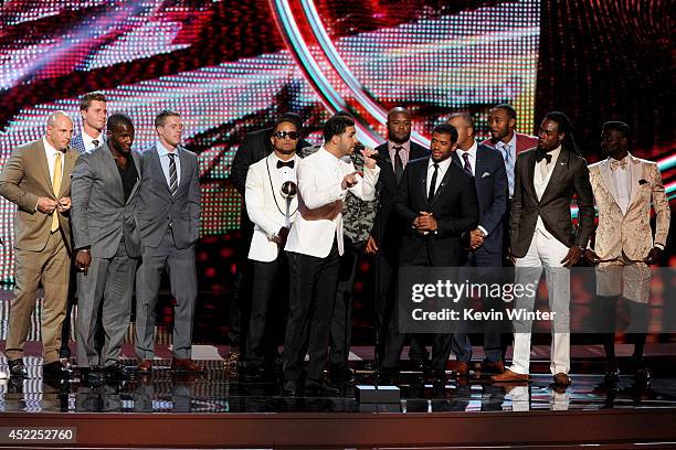 Host Drake with NFL players Golden Tate, Malcolm Smith, Russell Wilson, Richard Sherman and teammates from the Seattle Seahawks, winners of the Best...