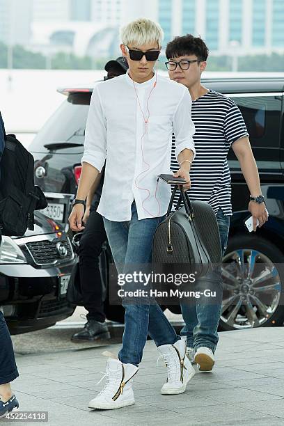 Tao of boy band EXO-M is seen on departure at the Incheon International Airport on July 17, 2014 in Incheon, South Korea.