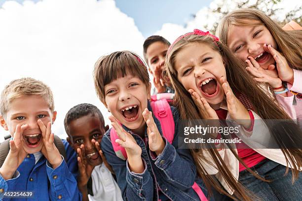 school children shouting outside - screaming stock pictures, royalty-free photos & images