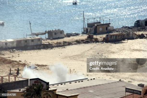 An Israeli airstrike kills 4 Palestinian children as they are playing on the beach on July 16, 2014 in Gaza City, Gaza. Bombing moment is seen in the...