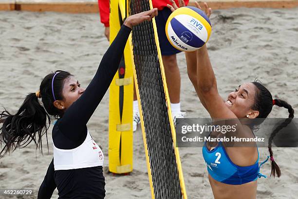 Vivian Baella of Peru competes against Natalie Giron of Guatemala in a beach volleyball match between peru and Guatemala as part of the XVII...