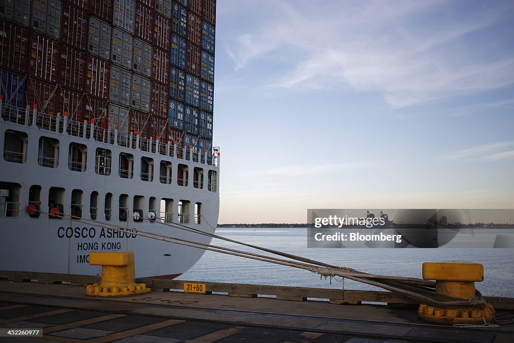 Container Ships Are Unloaded At An APM Terminal In Virginia