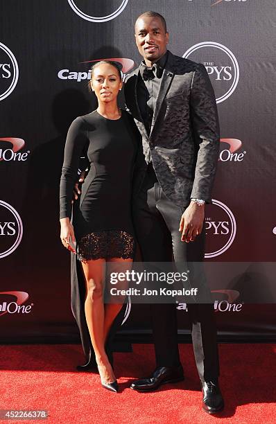 Keri Hilson and Serge Ibaka arrive at the 2014 ESPYS at Nokia Theatre L.A. Live on July 16, 2014 in Los Angeles, California.