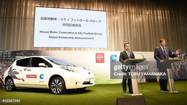 Ferran Soriano , CEO of City Football Group, which owns Manchester City Football Club, speaks as Carlos Ghosn , CEO and president of Nissan Motor,...