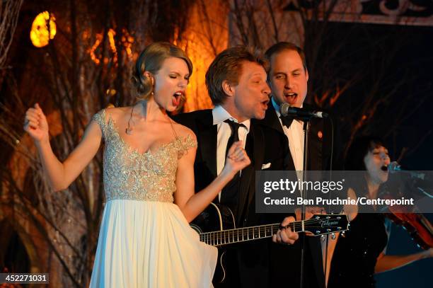 Taylor Swift, Jon Bon Jovi and Prince William, Duke of Cambridge perform during the Winter Whites Gala In Aid Of Centrepoint on November 26, 2013 in...