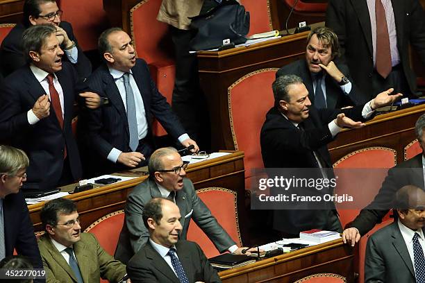 Senators of the PDL Party protest for the votes procedure over Silvio Berlusconi's Parliament expulsion at the Italian Senate, Palazzo Madama on...