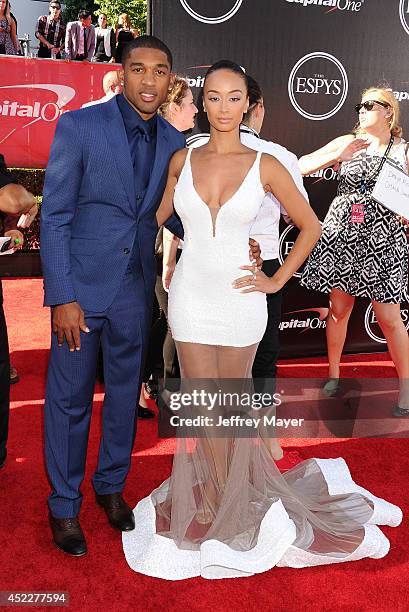 Personality Draya Michele and NFL player Orlando Scandrick arrive at the 2014 ESPY Awards at Nokia Theatre L.A. Live on July 16, 2014 in Los Angeles,...
