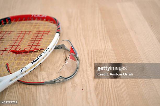 Detail of a racquet and glasses during Male«s Team Qualifications as part of the XVII Bolivarian Games Trujillo 2013 at Club Regatas on November 27,...