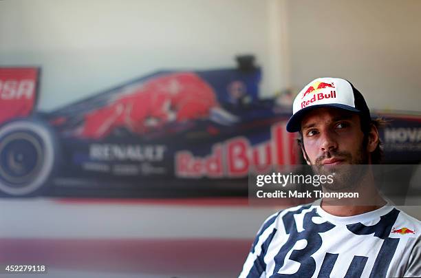 Jean-Eric Vergne of France and Scuderia Toro Rosso looks on during an interview during previews ahead of the German Grand Prix at Hockenheimring on...