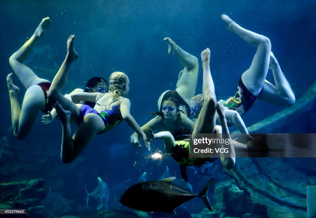 Russian Swimmers Perform Underwater Ballet In Wuhan