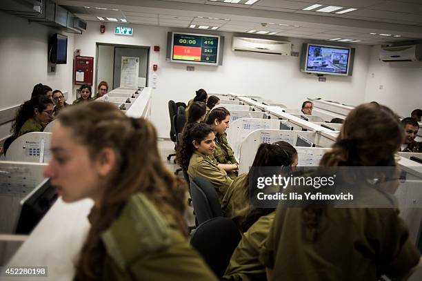 Israeli home front unit soldiers work at an emergency call centre on July 17, 2014 in Ramla, Israel.As the Israeli operation 'Protective Edge' enters...