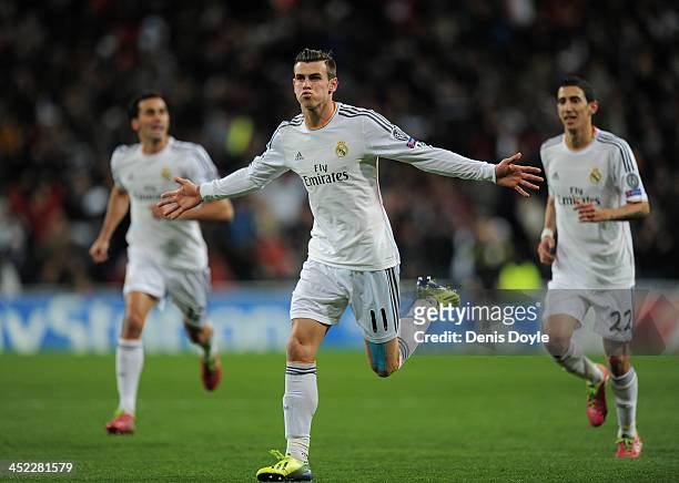 Gareth Bale of Real Madrid CF celebrates after scoring Real's opening goal during the UEFA Champions League group B match between Real Madrid CF v...