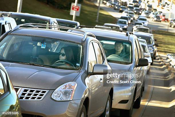 Traffic backs up on the Kennedy Expressway as commuters and holiday travelers try to get an early start on their Thanksgiving travel on November 27,...