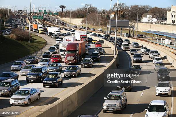 Traffic backs up on the Kennedy Expressway as commuters and holiday travelers try to get an early start on their Thanksgiving travel on November 27,...