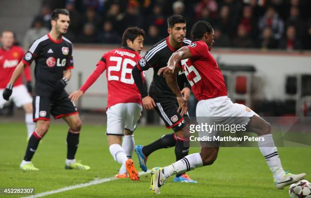 Antonio Valencia of Manchester United scores their first goal during the UEFA Champions League Group A match between Bayer Leverkusen and Manchester...