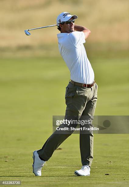 Adam Scott of Australia plays an approach shot during the first round of The 143rd Open Championship at Royal Liverpool on July 17, 2014 in Hoylake,...