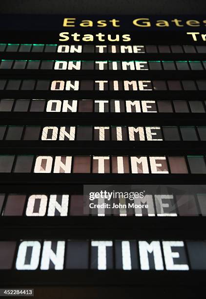 Signboard lists on-time Amtrak train departures at Pennsylvania Station on the busiest travel day of the year November 27, 2013 in New York City....