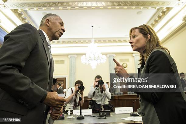 Rodney O'Neal , Chief Executive Officer and president of Delphi Automotive PLC, and Mary Barra, Chief Executive Officer of General Motors, talk after...
