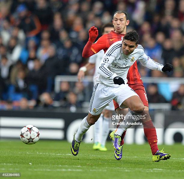 Galatasaray's Umut Bulut vies for the ball during the UEFA Champions League football match between Real Madrid vs Galatasaray at the Santiago...