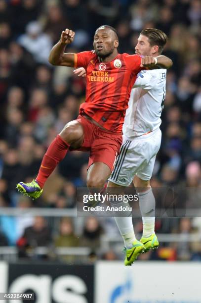 Galatasaray's Didier Drogba vies for the ball during the UEFA Champions League football match between Real Madrid vs Galatasaray at the Santiago...